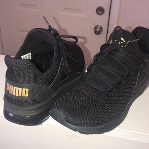 Puma black with gold lettering